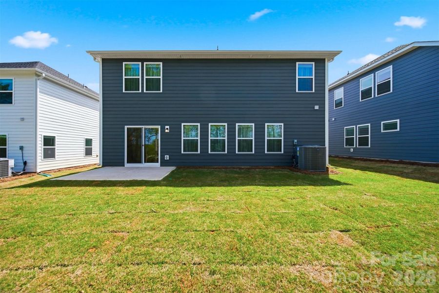 Exterior details and patio area of a home in Buffalo Ridge, Newton (Image 31).