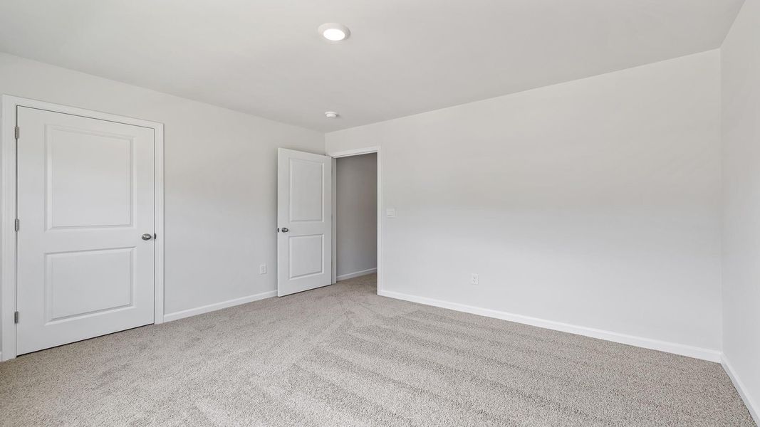 Spacious, unfurnished interior of a new home in Lakestone, Woodruff (Image 32).