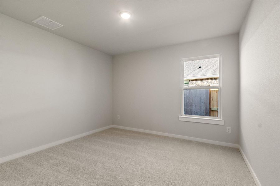 Spacious, unfurnished interior of a new home in Sunterra, Katy (Image 22).