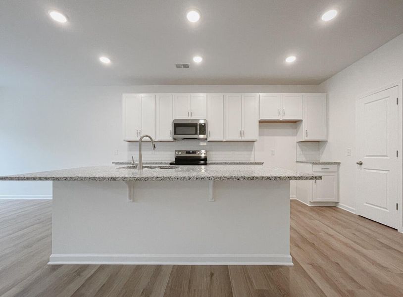 Furnished interior view inside a new home in East Main Townes, Spartanburg (Image 5).