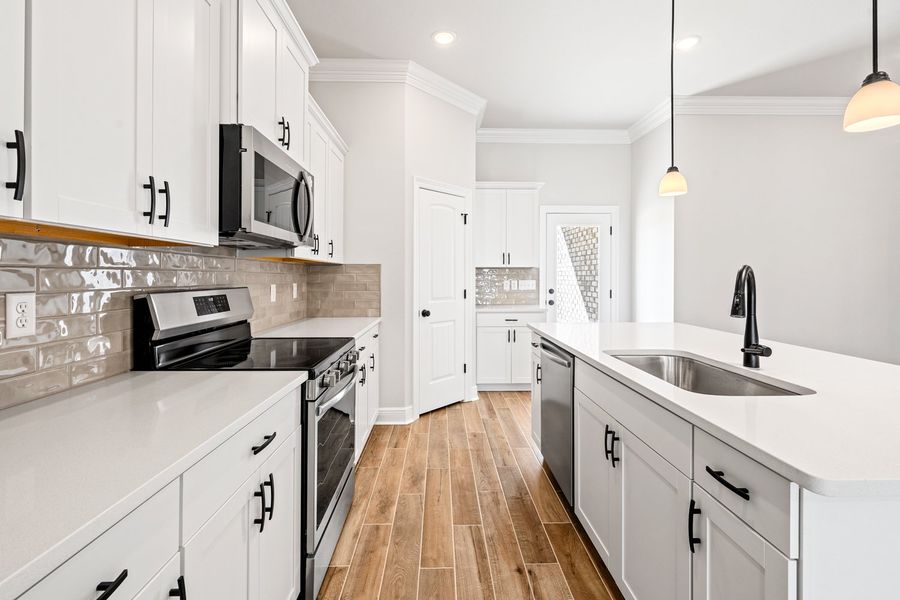 Furnished interior view inside a new home in Natureview, Freeport (Image 6).