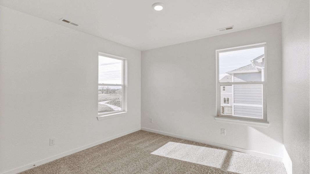 Representative unfurnished interior of a home built from the Elm by D.R. Horton in The Ridge at Lorson Ranch, Colorado Springs (Image 14).