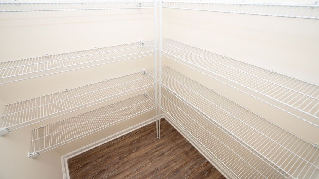 Representative unfurnished interior of a home built from the CALI by D.R. Horton in The Reserve at Wild Horse, Conway (Image 21).