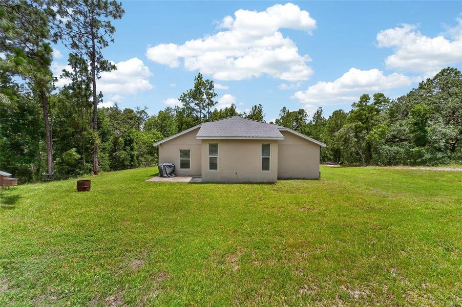 Exterior details and patio area of a home in , Brooksville (Image 3).