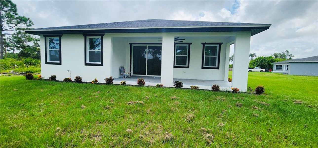 Exterior details and patio area of a home in , Port Charlotte (Image 14).