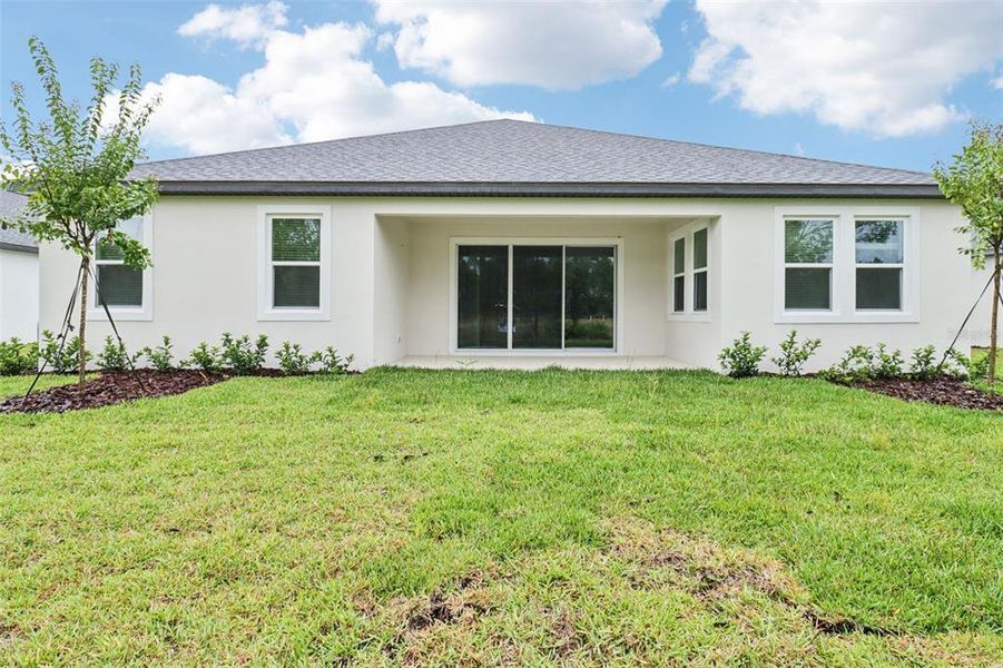 Exterior details and patio area of a home in Ridgehaven - Reserve Series, Ormond Beach (Image 22).