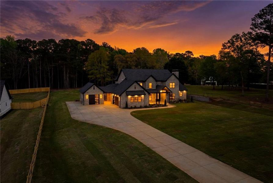Front exterior of a new home in , Monroe, GA, highlighting curb appeal (Image 28). Front exterior of a new home in , Monroe, GA, highlighting curb appeal (Image 28).