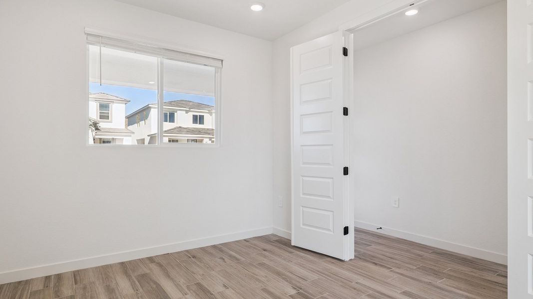 Representative unfurnished interior of a home built from the Crow by D.R. Horton in The Ridge at Stone Butte, Phoenix (Image 20).