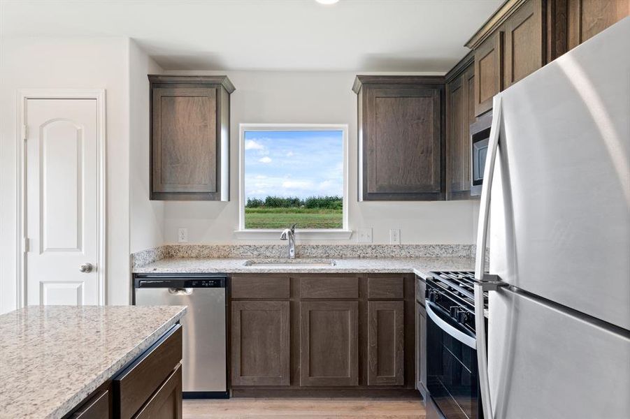 Furnished interior view inside a new home in Cresson Estates, Cresson (Image 3).