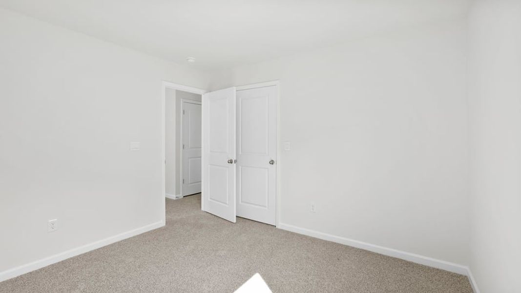 Spacious, unfurnished interior of a new home in Varner Station, Woodruff (Image 26).