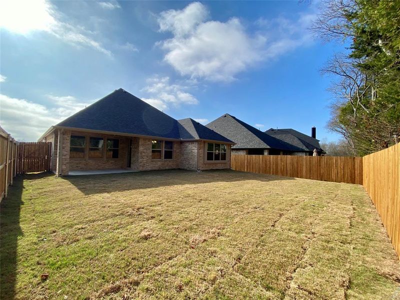 View from back yard towarrds back of the home View from back yard towarrds back of the home