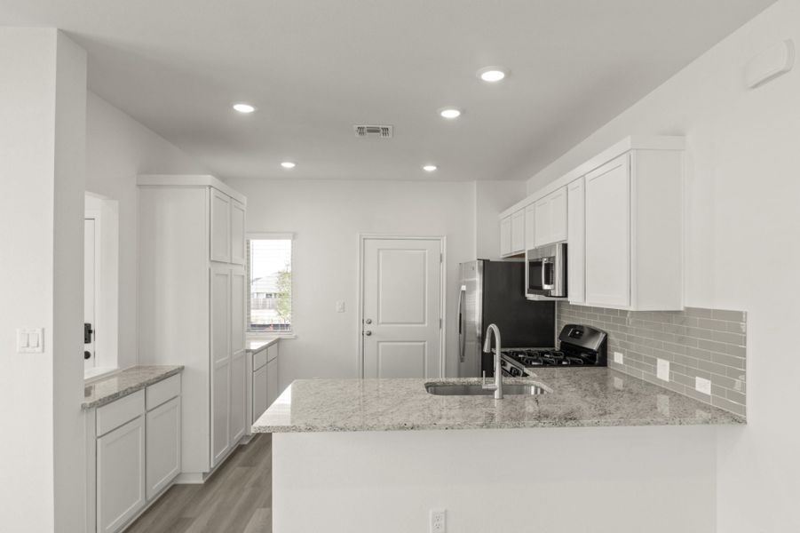 Representative furnished interior of a home built from the Frisco by Pacesetter Homes in Crosswinds, Kyle (Image 8).