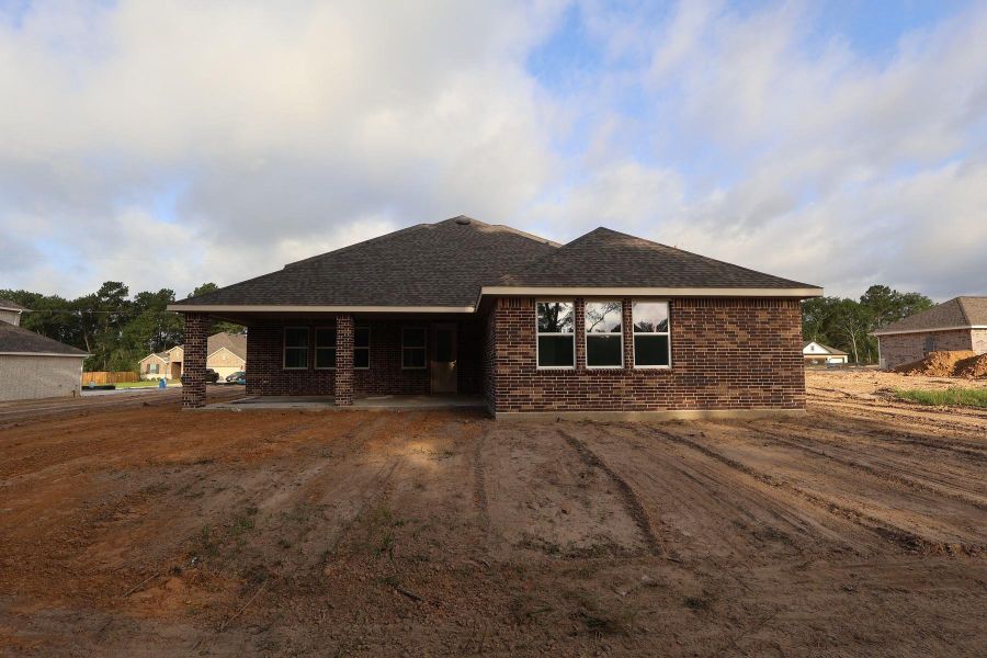 Backyard with covered patio - still under construction!