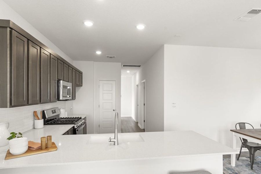Representative furnished interior of a home built from the Ash by Pacesetter Homes in Blanco Vista, San Marcos (Image 26).