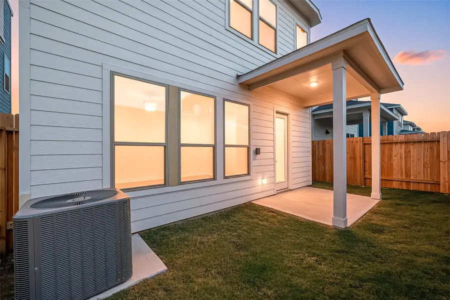 The covered patio offers a comfortable spot to unwind while overlooking the private, fenced backyard—an inviting extension of the home’s living space. The covered patio offers a comfortable spot to unwind while overlooking the private, fenced backyard—an inviting extension of the home’s living space.