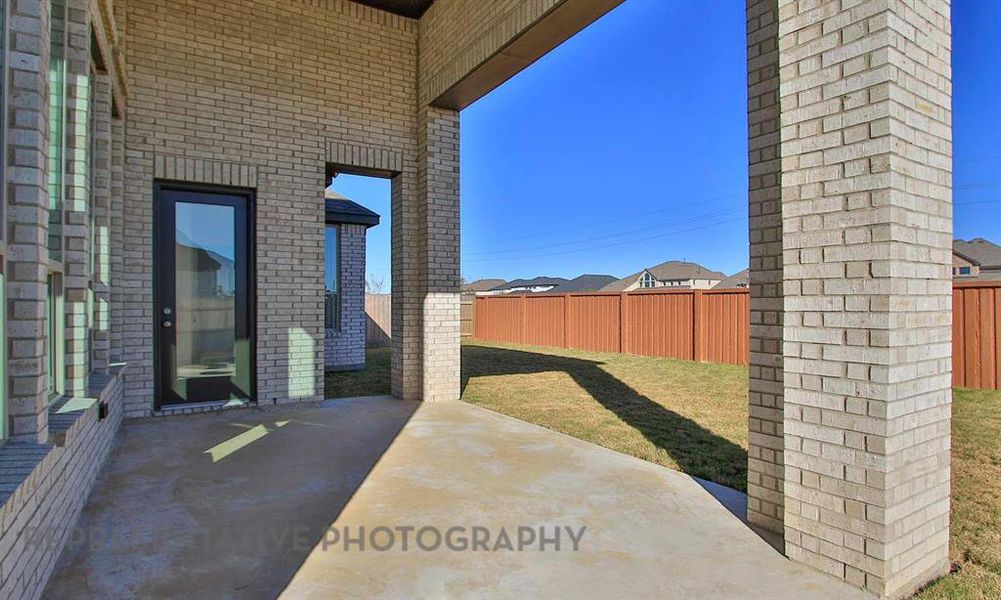 Exterior details and patio area of a home in Star Trail, Prosper (Image 2).