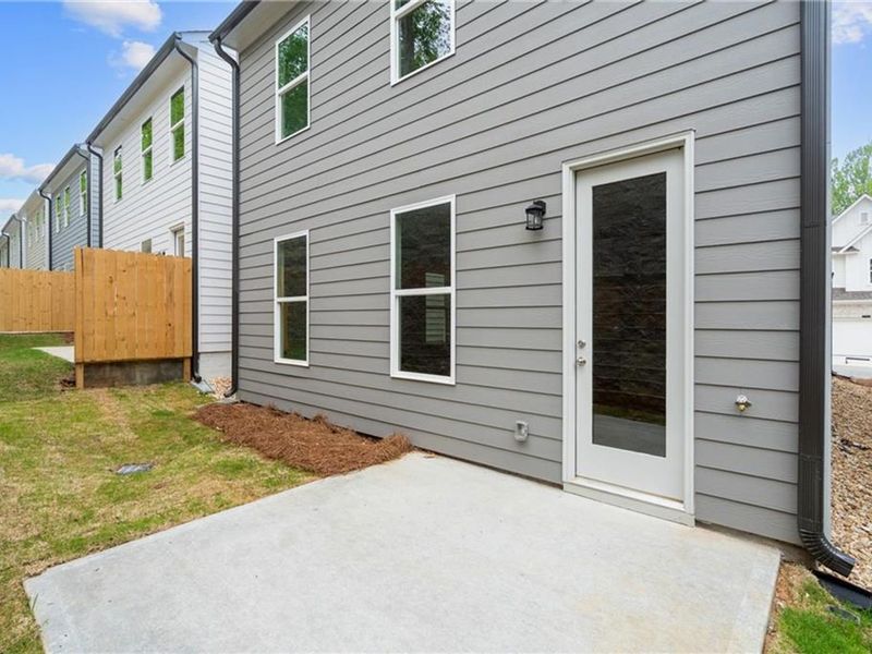 Exterior details and patio area of a home in The Village at Shallowford, Kennesaw (Image 16).