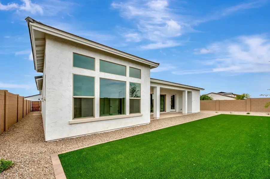 Exterior details and patio area of a home in Escena at Blossom Rock, Apache Junction (Image 4).