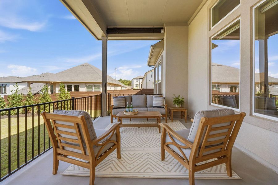 Balcony featuring a residential view and outdoor furniture Balcony featuring a residential view and outdoor furniture