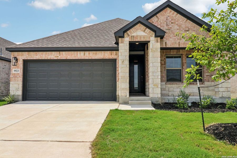 Front exterior of a new home in Kallison Ranch, San Antonio, TX, highlighting curb appeal (Image 24).