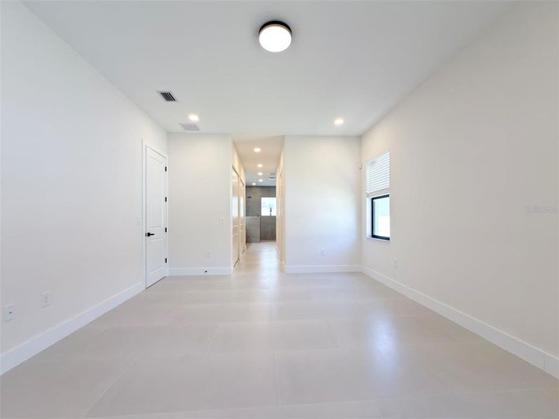 Spacious, unfurnished interior of a new home in , Port Charlotte (Image 36).