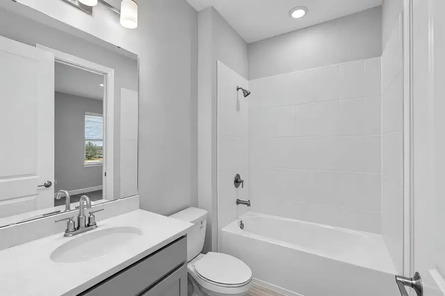 Furnished interior view inside a new home in Coasterra Community Group Page, Palmetto (Image 4).