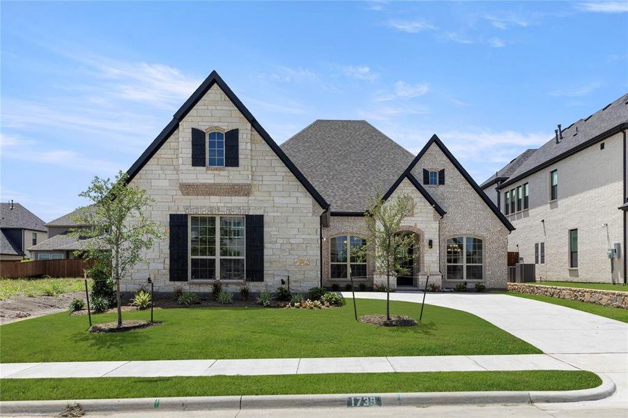 Front exterior of a home in the Gideon Grove, Phase 2 community, located in Rockwall, TX (Image 1).
