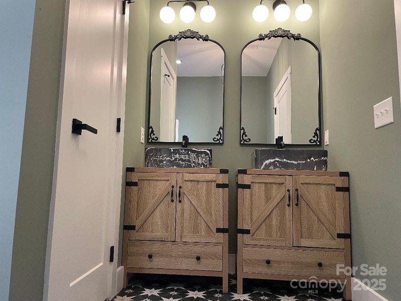Hall bath - double vanity and walk-in linen closet