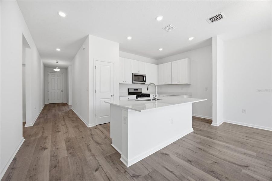 Furnished interior view inside a new home in , Okahumpka (Image 7).