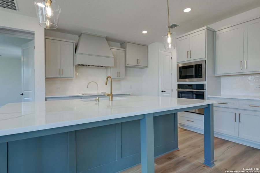 Furnished interior view inside a new home in Megan's Landing 70's, Castroville (Image 7).