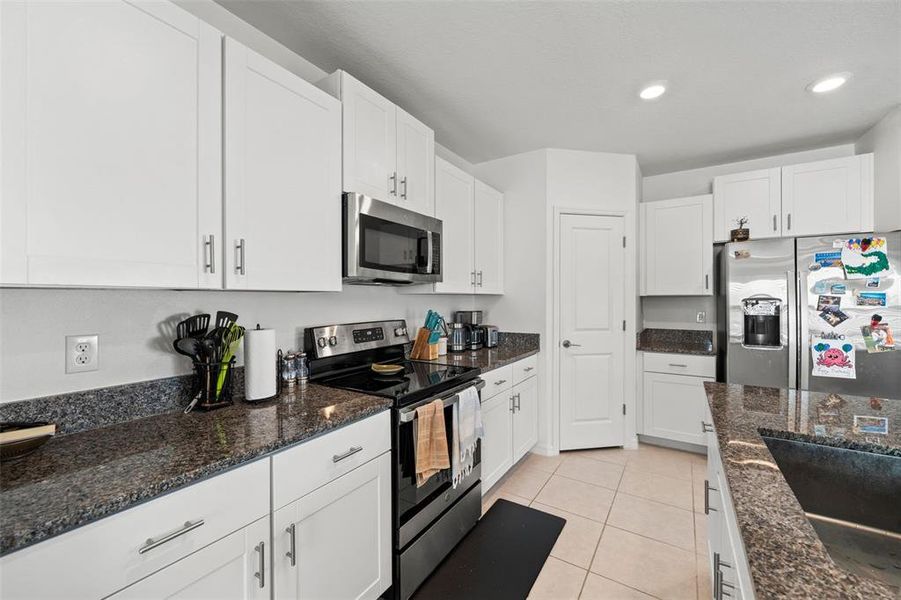 Furnished interior view inside a new home in Verano: The Manors, Spring Hill (Image 13).