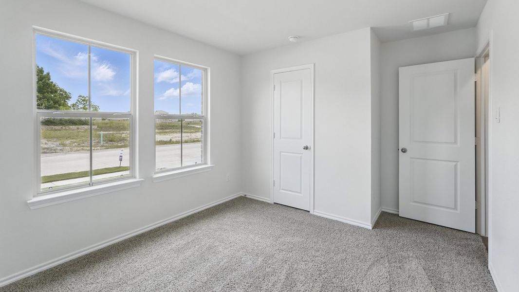 Spacious, unfurnished interior of a new home in Crane Crossing, Crandall (Image 19).