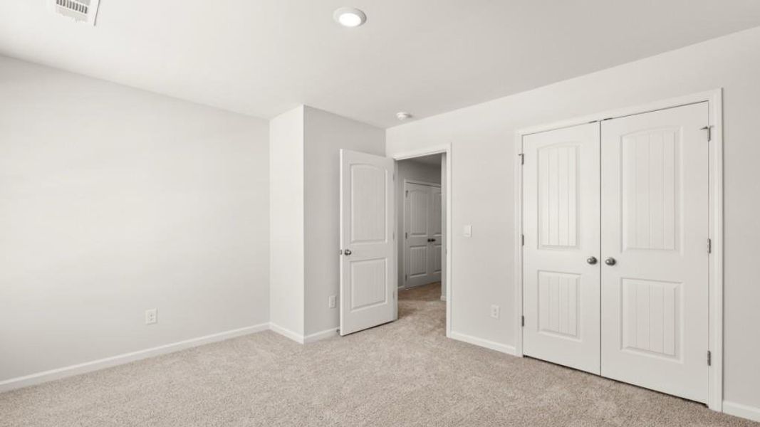Spacious, unfurnished interior of a new home in Parkside at Carter Grove, Cartersville (Image 24).