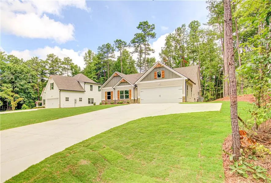 Front exterior of a new home in , Villa Rica, GA, highlighting curb appeal (Image 25).