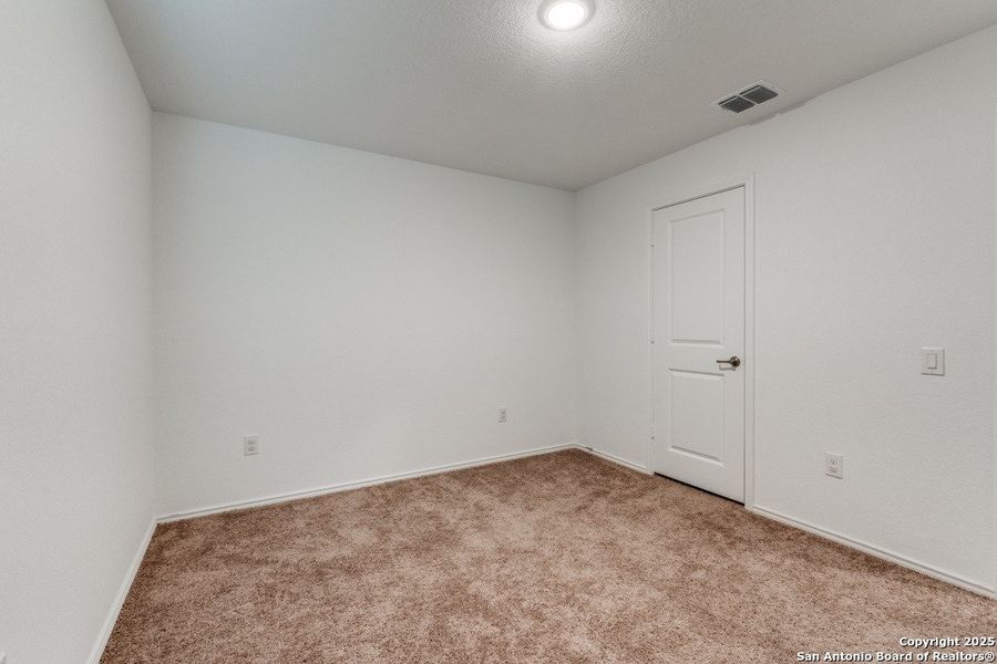 Spacious, unfurnished interior of a new home in Mission del Lago: Cottage Collection, San Antonio (Image 11).