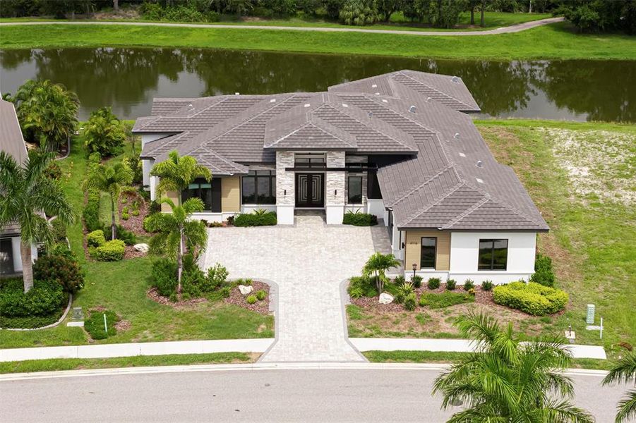 Front exterior of a new home in , Bradenton, FL, highlighting curb appeal (Image 26). Front exterior of a new home in , Bradenton, FL, highlighting curb appeal (Image 26).