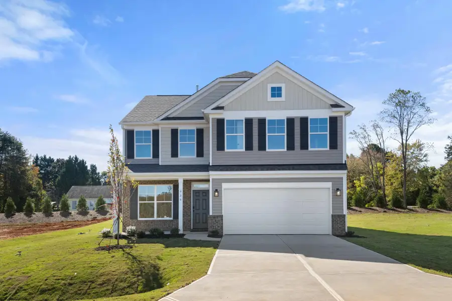 Front exterior of a new home in Pisgah Park, Kernersville, NC, highlighting curb appeal (Image 1).