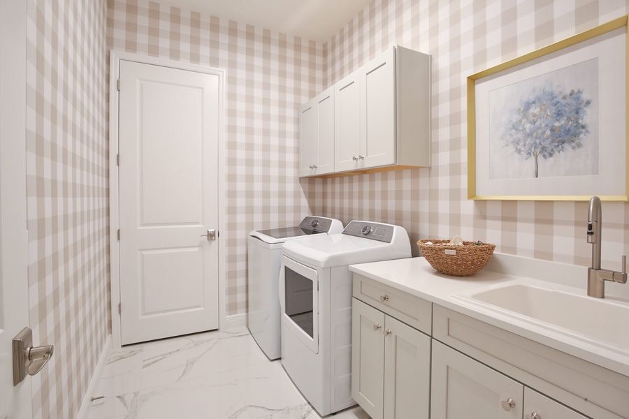 Furnished interior view inside a new home in Boca Royale Golf & Country Club at Wellen Park, Englewood (Image 26).