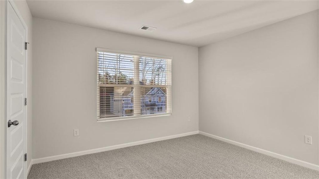 Spacious, unfurnished interior of a new home in Brooks Station, Dacula (Image 19).