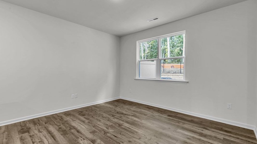 Spacious, unfurnished interior of a new home in The Townes at Bexford, Willow Spring (Image 13). Spacious, unfurnished interior of a new home in The Townes at Bexford, Willow Spring (Image 13).
