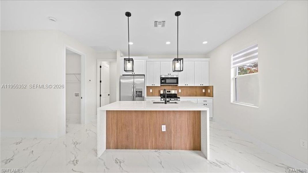 Furnished interior view inside a new home in , Lehigh Acres (Image 9).