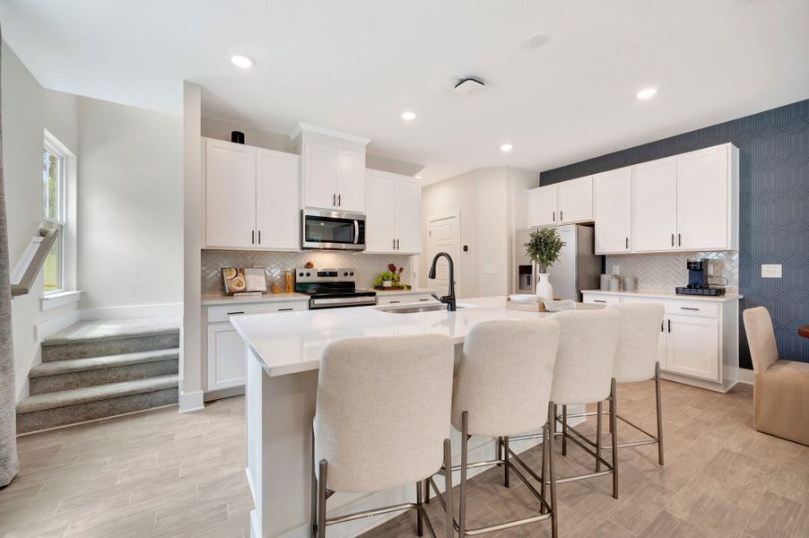 Representative furnished interior of a home built from the Vienna by Mattamy Homes in Ashmore Townes, Garner (Image 10).