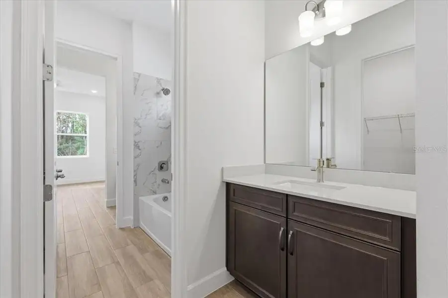 Furnished interior view inside a new home in Parkdale Place, Oviedo (Image 10).