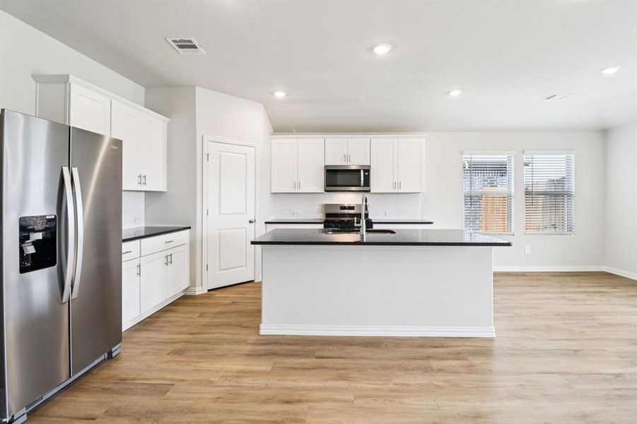 Furnished interior view inside a new home in Trails of Lavon - Signature Series, Lavon (Image 14). Furnished interior view inside a new home in Trails of Lavon - Signature Series, Lavon (Image 14).