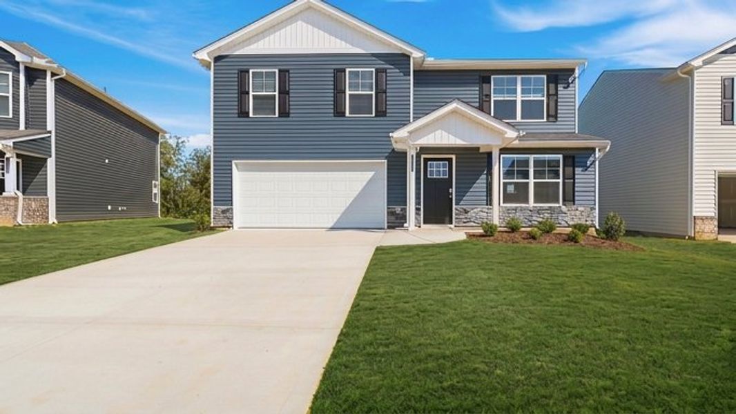 Front exterior of a new home in Johnson Farms, Greeneville, TN, highlighting curb appeal (Image 2). Front exterior of a new home in Johnson Farms, Greeneville, TN, highlighting curb appeal (Image 2).