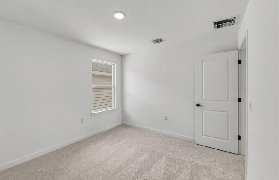Spacious, unfurnished interior of a new home in Cameron Place, Manor (Image 25).