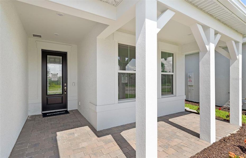Exterior details and patio area of a home in BeachWalk by Manasota Key, Englewood (Image 3). Exterior details and patio area of a home in BeachWalk by Manasota Key, Englewood (Image 3).