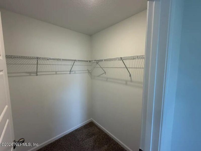 Spacious, unfurnished interior of a new home in Sawmill Branch, Palm Coast (Image 13).