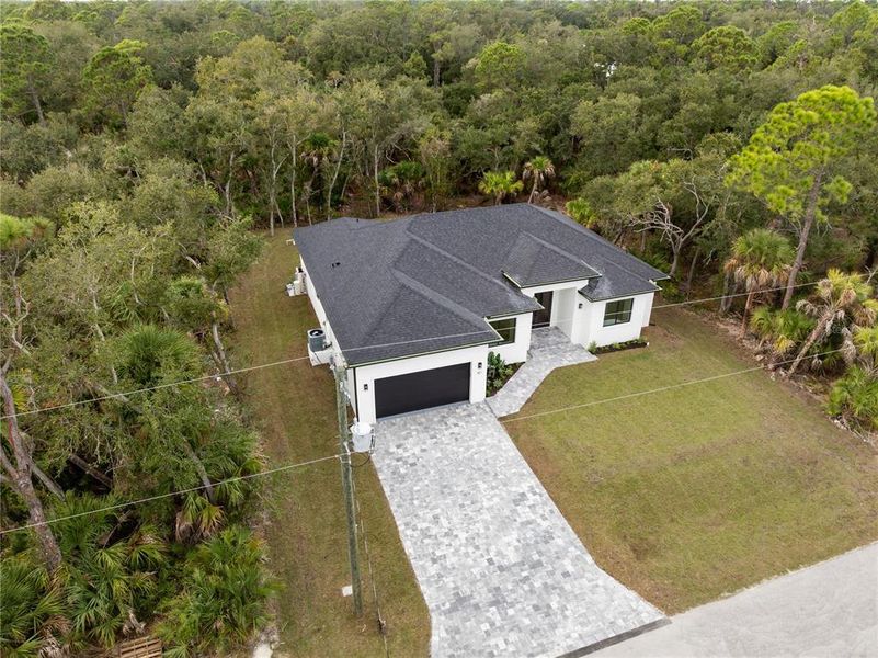 Front exterior of a new home in , Port Charlotte, FL, highlighting curb appeal (Image 34).