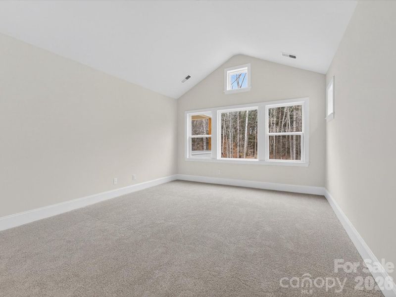 Spacious, unfurnished interior of a new home in North Creek Village, Huntersville (Image 29).